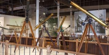 Row of antique telescopes on exhibition at the State Museum