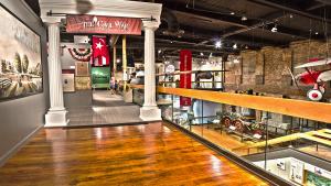 Large, replica white columns with banner that reads The Civil War in South Carolina as the entrance to an exhibition space