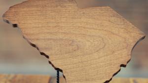 Dark Wooden Cutting Board in SC State Shape