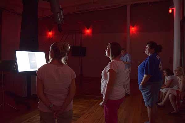 Workshop participants in the Boeing Observatory at night.