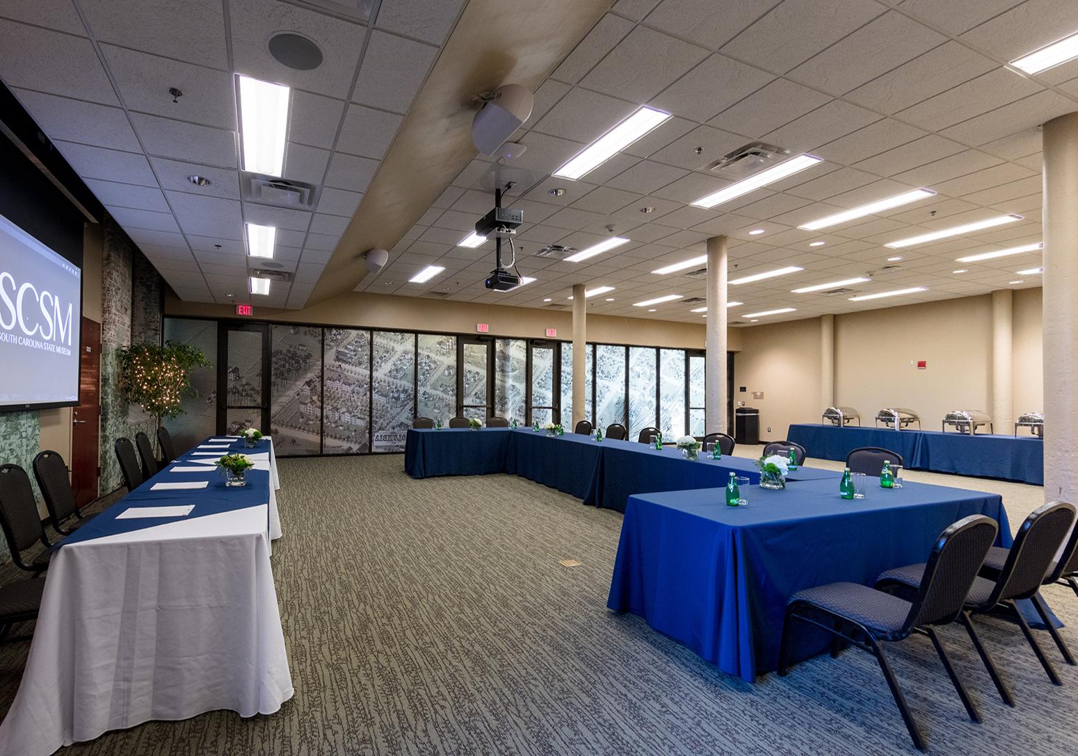 Gervais Street Room with tables and chair set up for a meeting