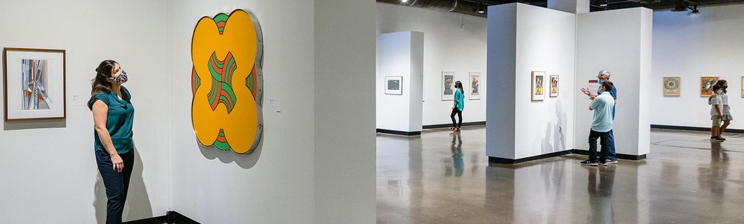 Gallery with a graphic shown on the wall and other art around the room