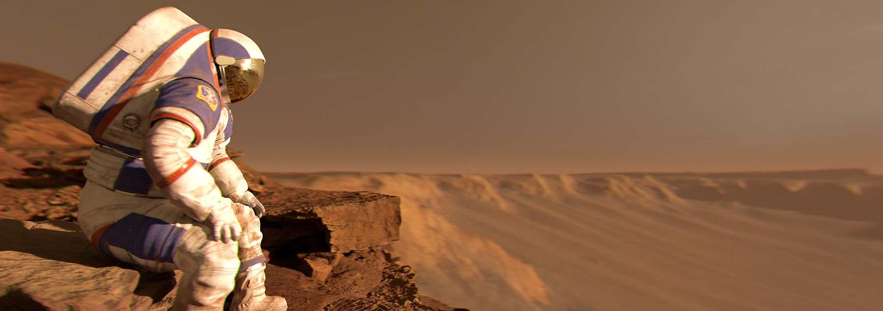 Astronaut sits wearing a white spacesuit with a red, dusty landscape visible behind them