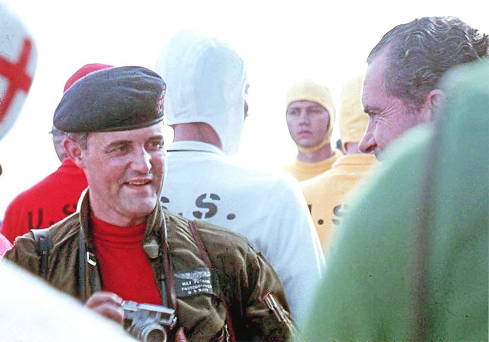 President Richard Nixon and photographer Milt Putnam after the recovery of the Apollo 11 crew.