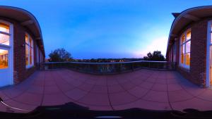 360 view from the State Museum observatory looking out over Gervais St. and the Congaree River with the observatory and telescope in view.